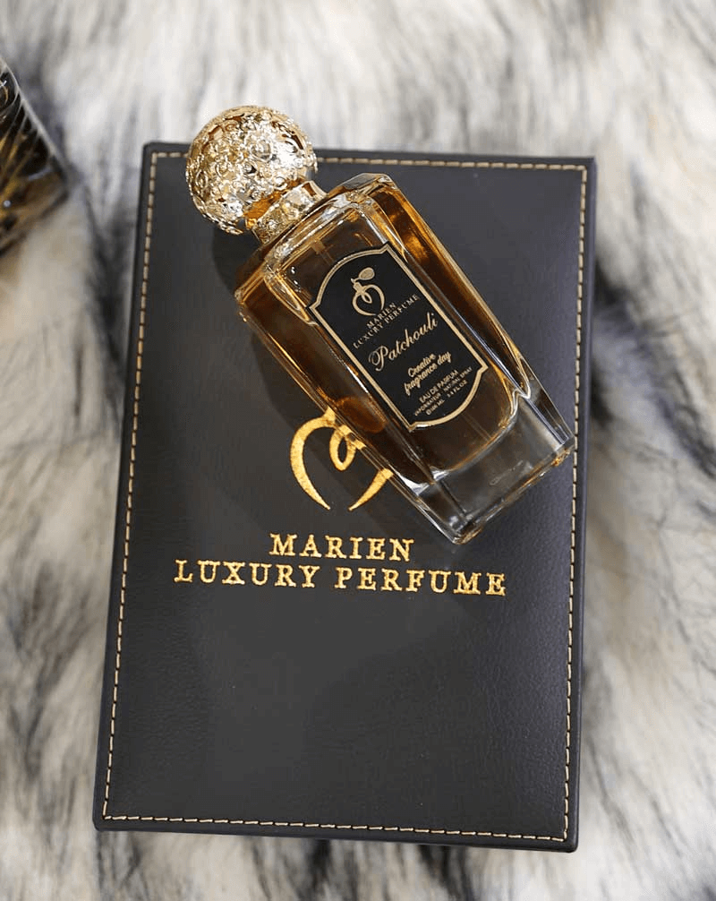 Luxury Marien Patchouli Eau de Parfum - 10ml & 100ml Embrace elegance with Marien Patchouli Unisex Eau de Parfum. A luxurious, long-lasting oriental, woody scent crafted from quality oils.