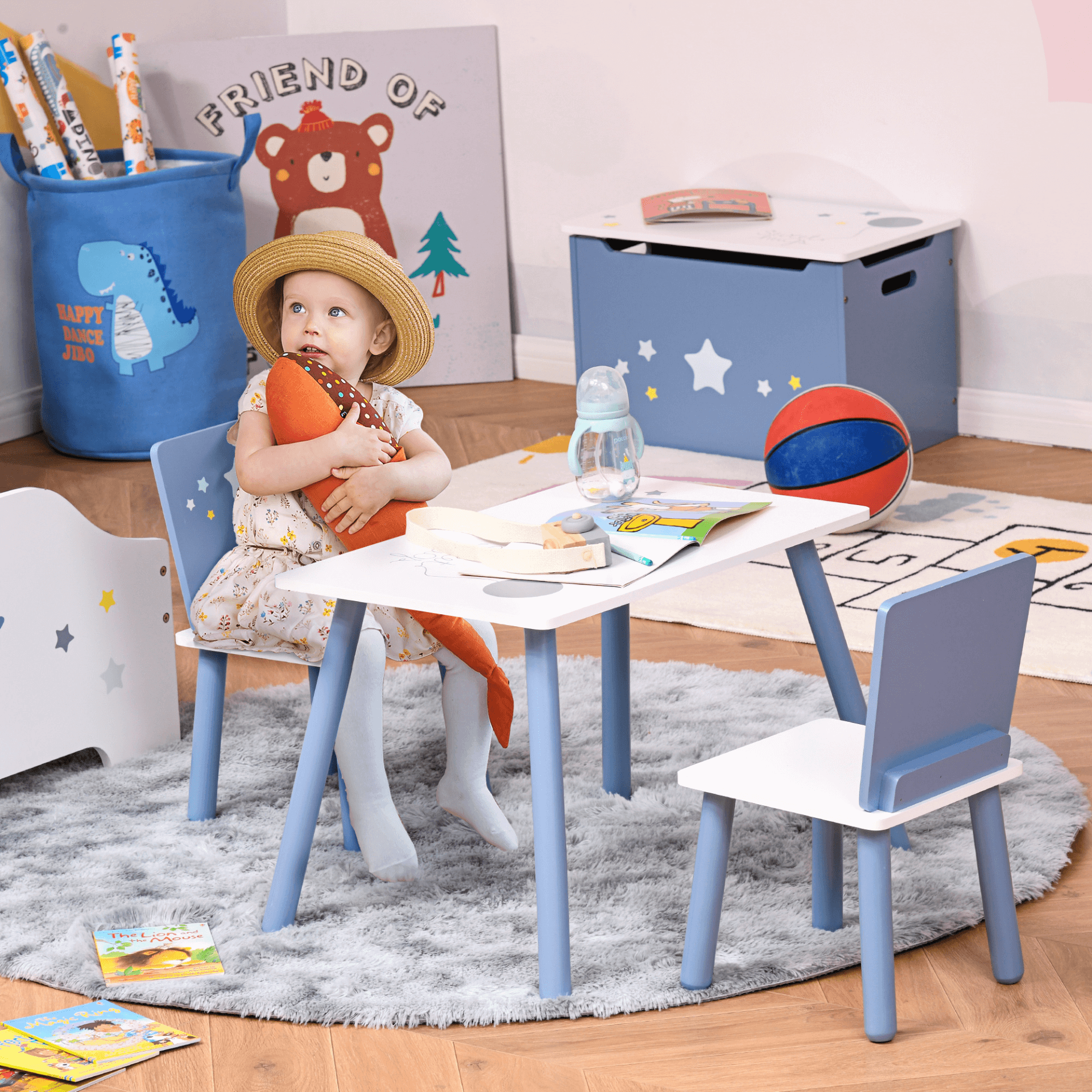 HOMCOM Kids Table & Chairs Set - Playroom Essential, 3-piece blue set with safe corners and cute star design, perfect for playdates and crafts in any kids' room. Durable and stylish!