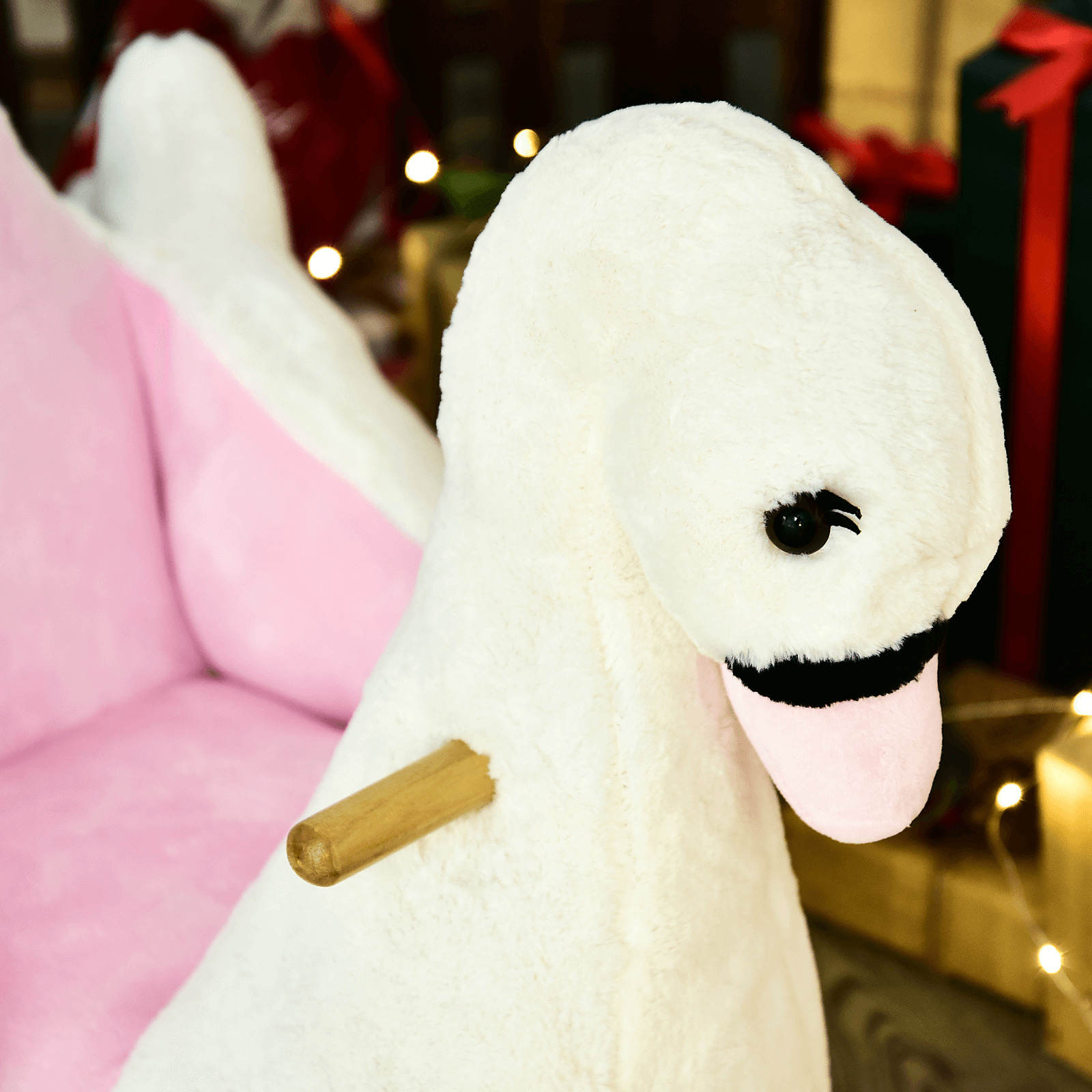 HOMCOM Plush Ride-On Swan Toy for Kids | Rocking Horse, Discover the HOMCOM Swan Rocking Horse—safe, sturdy, and fun! Perfect for imaginative play with music and a safety seat for your little one.