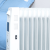 HOMCOM 2180W Digital Oil Filled Radiator - 9 Fin Heater, Stay warm this winter with the HOMCOM 2180W heater. Adjustable, remote-controlled, and energy-efficient for your cozy comfort.