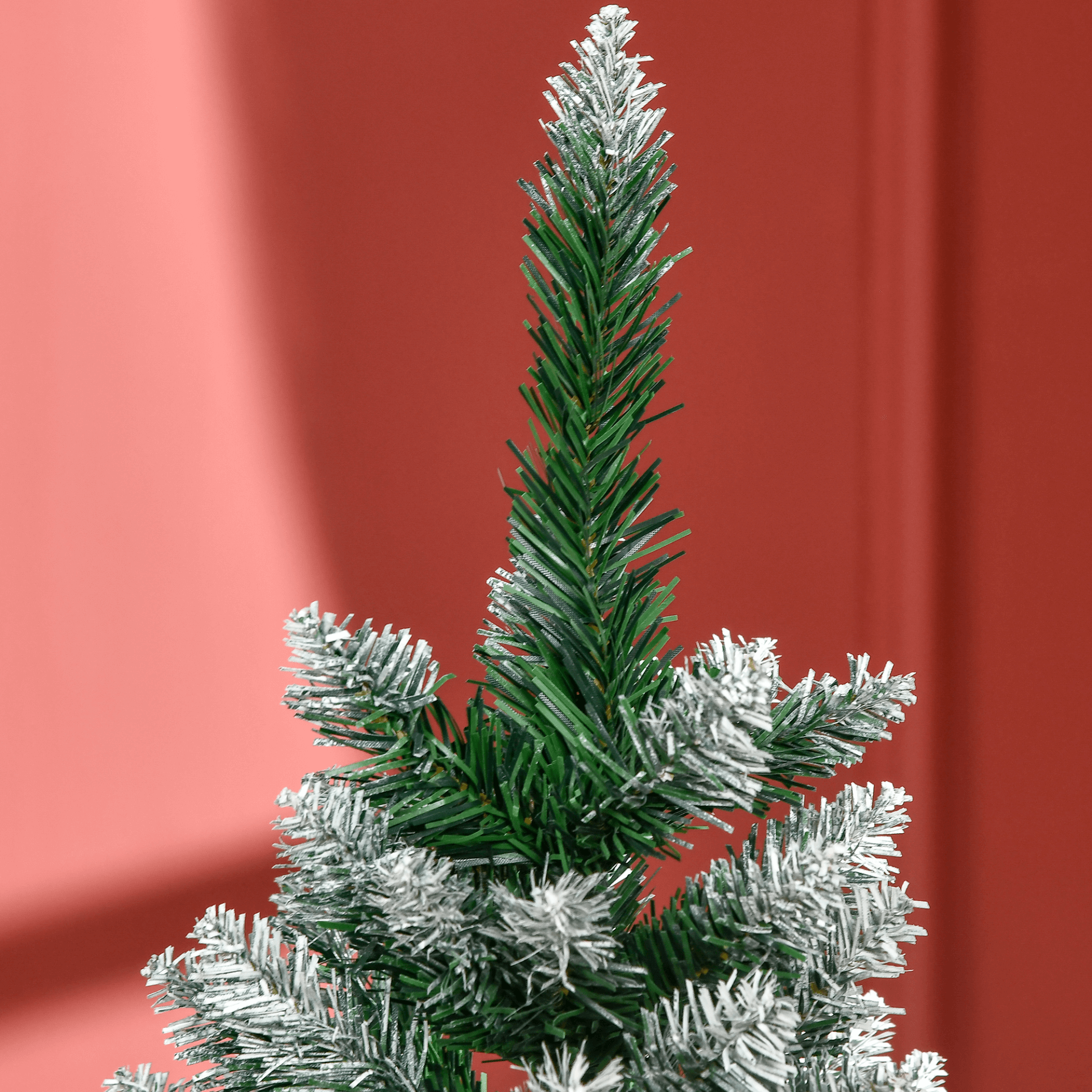 5 Ft Snowy Artificial Christmas Tree with Pine Cones, Bring winter's magic indoors with our 5 Ft Snow Christmas Tree, featuring realistic branches and pine cones. Perfect for creating a lush holiday atmosphere.