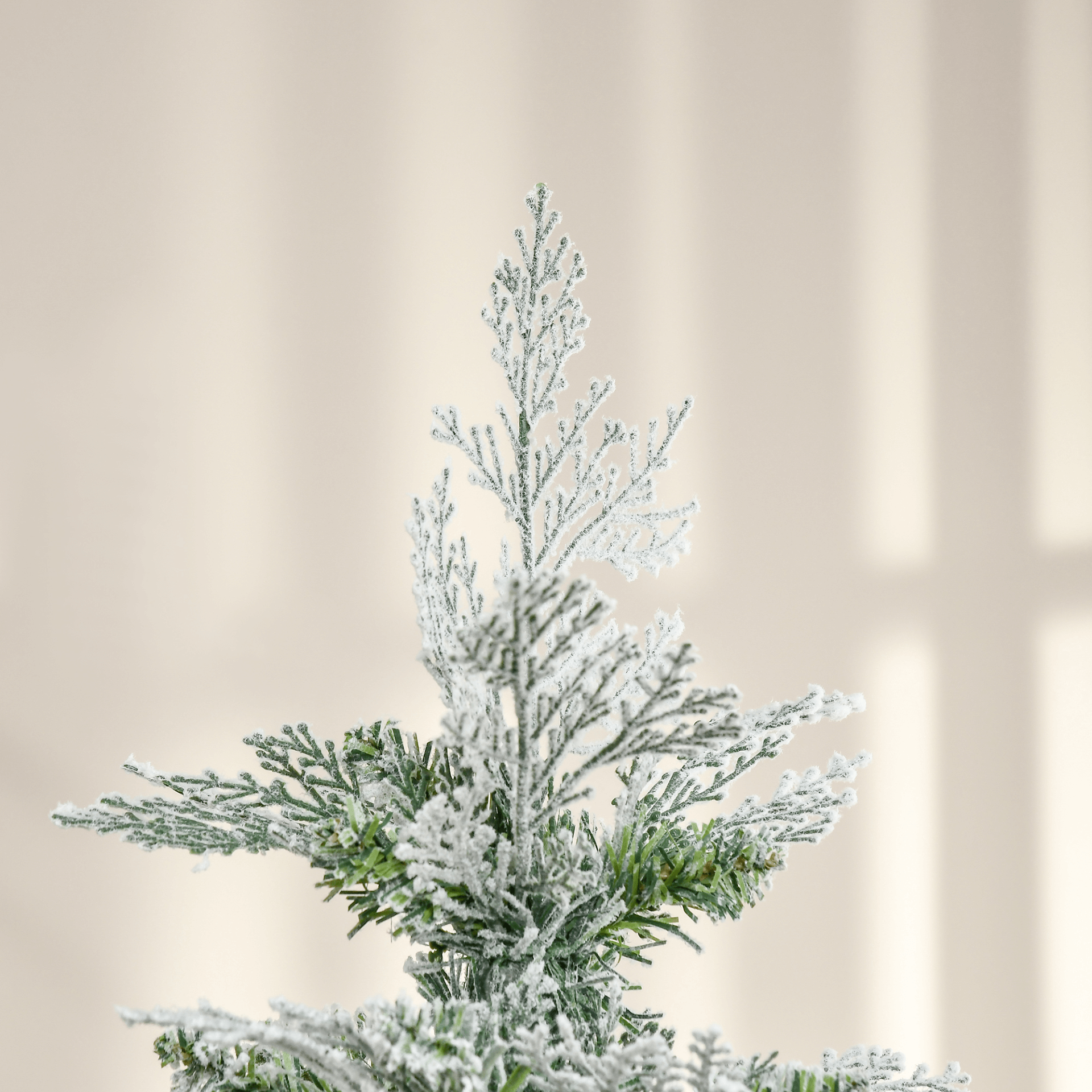 6 Ft Snow Flocked Pencil Christmas Tree, Create a winter wonderland with this 6 Ft Snow Flocked Artificial Tree. Realistic cypress branches, easy assembly, and a stable base included.