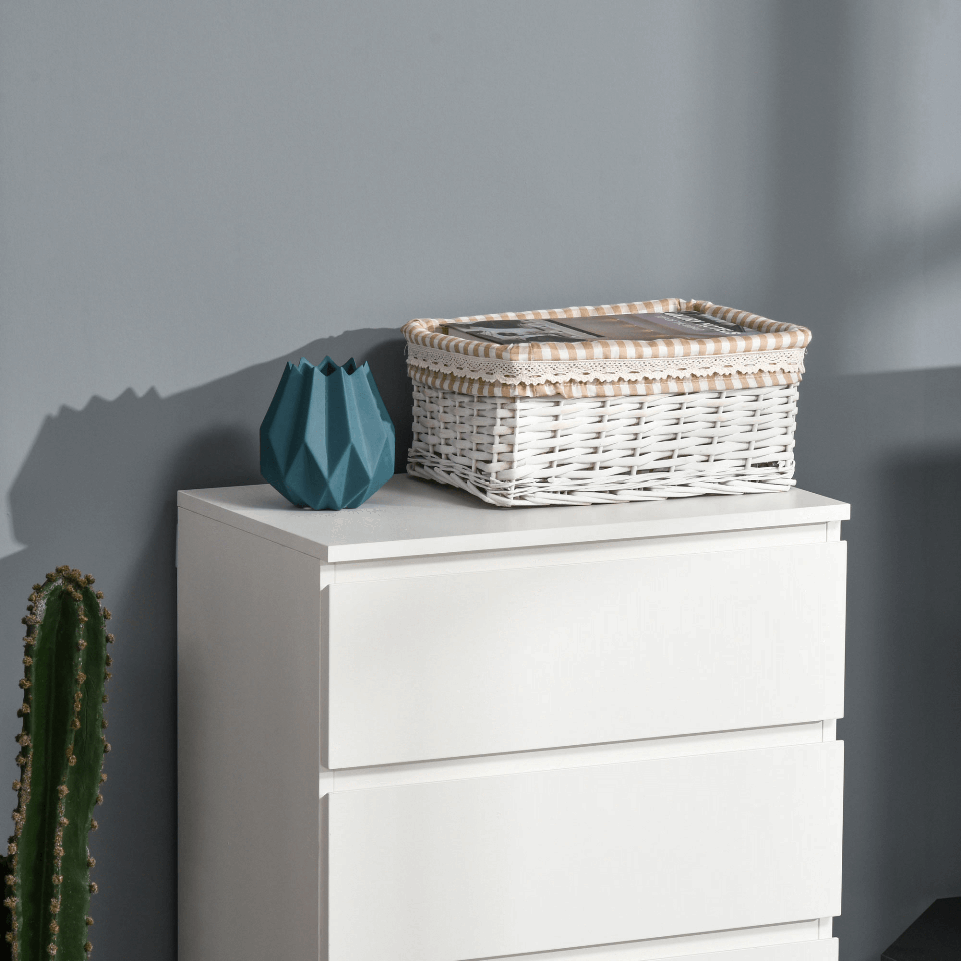 White 5-Drawer Chest – Modern Storage for Home, Upgrade your bedroom with this stylish white 5-drawer chest. Perfect for ample storage of clothes and accessories, adding elegance and functionality.