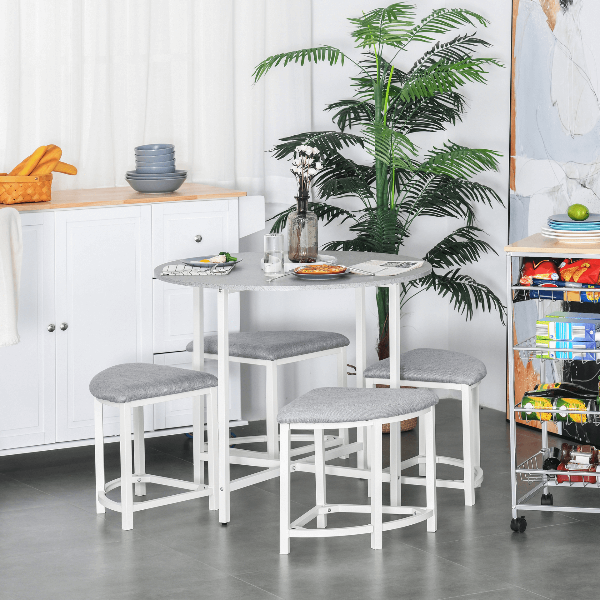 Modern Round Dining Table Set with 4 Stools, Perfect for family gatherings, this set features a compact, space-saving design with four upholstered stools that tuck neatly under the table.