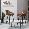 HOMCOM Set of 2 Retro Bar Stools - Elegant Brown Design, Elevate your dining area with HOMCOM's sleek retro bar stools. This set of two features faux leather upholstery and stylish steel legs.