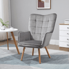 Modern Velvet Tufted Wingback Armchair - Grey, Elevate your space with our Modern Velvet Wingback Armchair. Luxurious tufted design, superior comfort with high-density padding, and durable wooden legs.