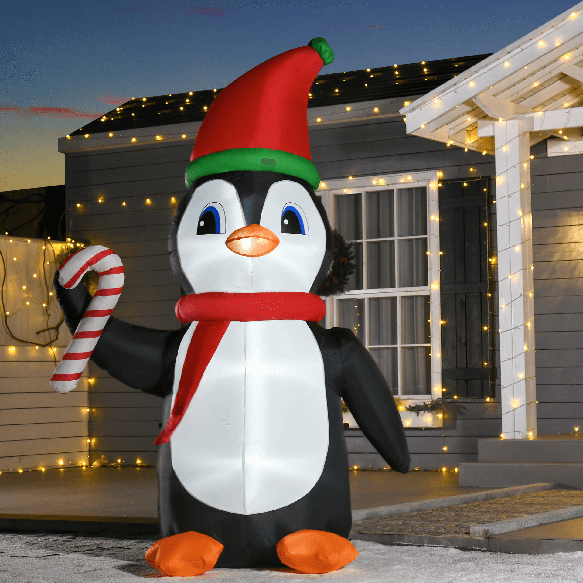 8ft Inflatable Christmas Penguin with LED Lights, Transform your yard into a festive wonderland with this 8ft Inflatable Christmas Penguin holding a candy cane. Perfect for holiday cheer!