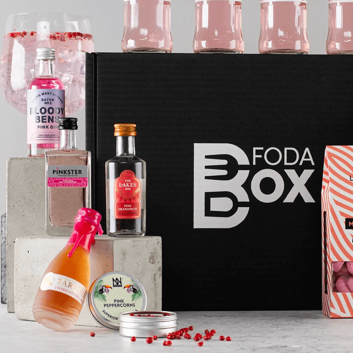 Luxurious Craft Pink Gin and Tonic Gift Hamper, Discover the ultimate gift for gin lovers—luxurious pink gin, premium tonics, and gourmet snacks in an elegant signature box. Ideal for any occasion.