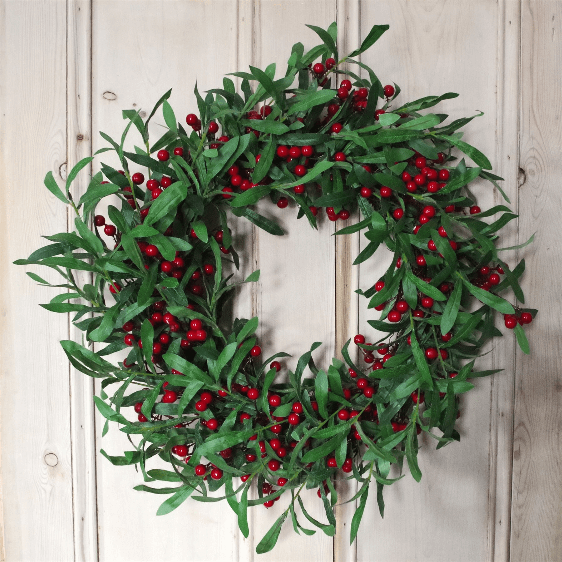 Luxury Christmas Wreath - 60cm by Leaf Design, Enhance your holiday decor with an elegant Christmas wreath featuring mistletoe and red berries, crafted by Leaf Design. Perfect for any door.