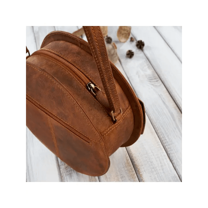 Vintage Round Leather Handbag - Classic Style Discover elegance with our Round Leather Handbag. Perfectly aged, offering ample storage and unisex design for any occasion.