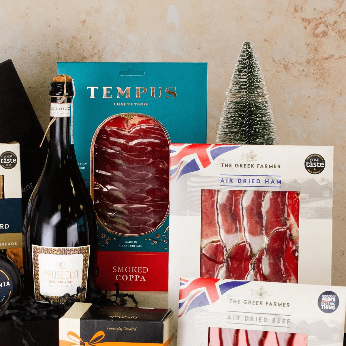 Luxury Christmas Wonders Gift Hamper, Discover festive cheer with gourmet treats, artisan cheese, and Prosecco. Perfect for joyful celebrations! Ideal festive gift solution.