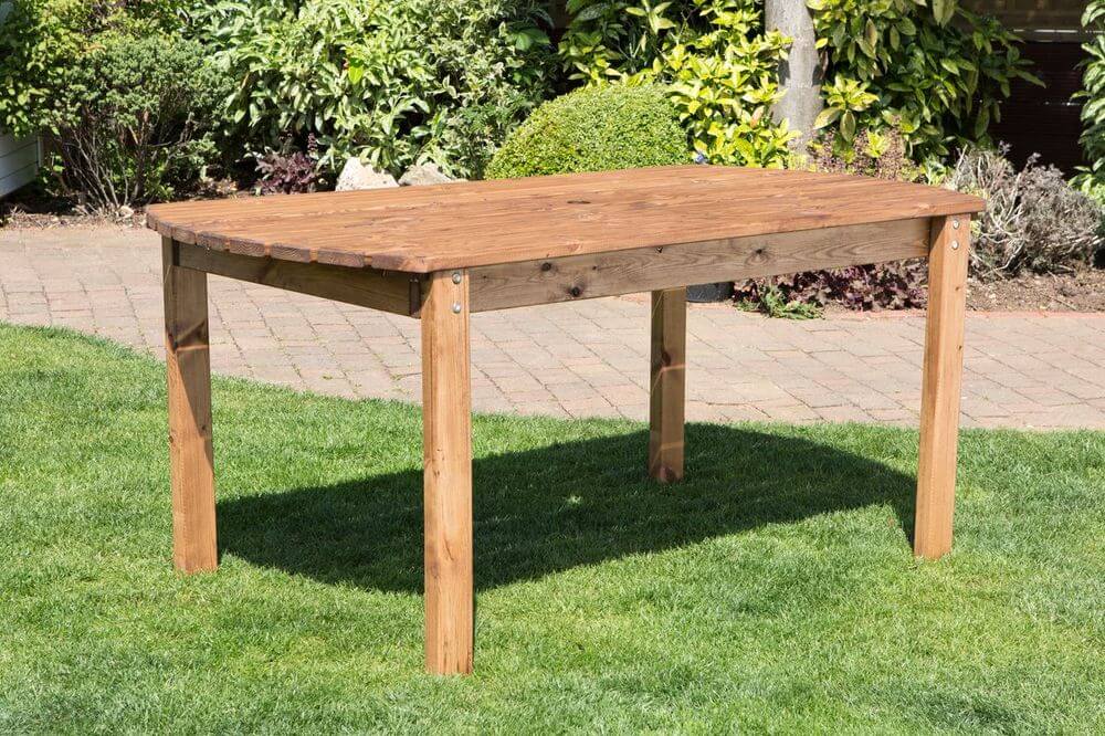 Charles Taylor Rectangular Table - Durable & Elegant, Discover the Charles Taylor Rectangular Garden Table, crafted in Britain with an elegant design and parasol hole for shaded gatherings of up to four.