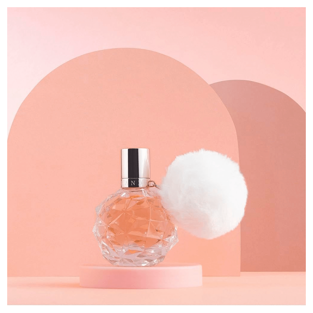 Ariana Grande Ari Eau De Parfum Spray 100ml - Sweet Glamour, Discover the playful notes of Ariana Grande Ari Eau De Parfum 100ml, featuring sparkling pear, raspberry, and floral heart notes for a delightful scent.