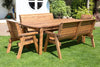 Eight Seater Wood Dining Set for Outdoor Gatherings, Enjoy outdoor dining with this solid wood eight-seater set, ideal for gatherings with family and friends. Includes armchairs, benches, and a table.