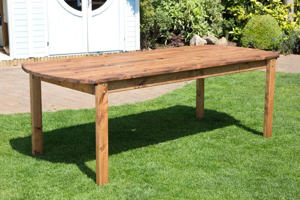 Charles Taylor Rectangular Table - Durable & Elegant, Discover the Charles Taylor Rectangular Garden Table, crafted in Britain with an elegant design and parasol hole for shaded gatherings of up to four.